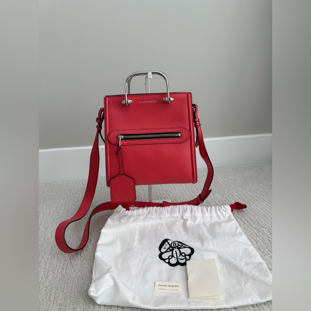 Alexander McQueen Short Story in coral $2,290